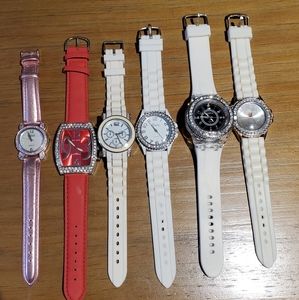 6 watches white, red, and pink metallic.